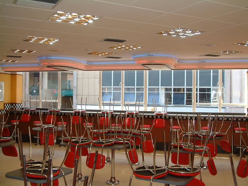 Bright, contemporary bar area with seating and city views in Bristol.