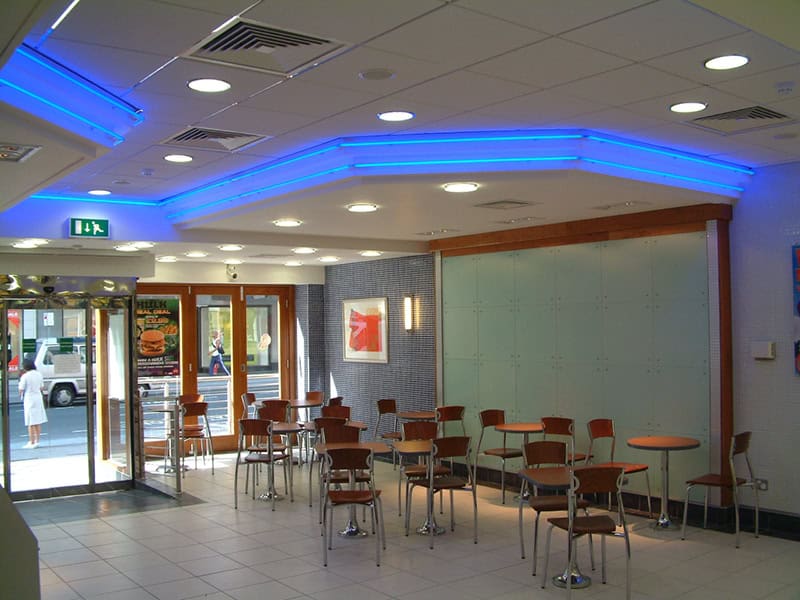 Burger King Bristol restaurant interior with contemporary lighting and seating arrangement.