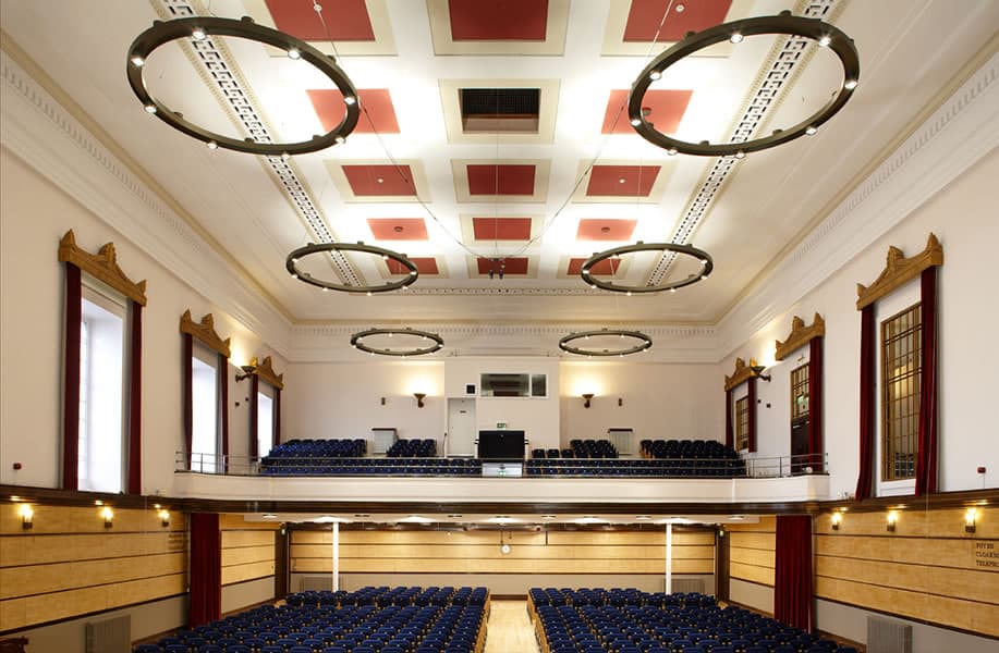 Elegant interior of The Victoria Rooms, Bristol, showcasing historic design and lighting fixtures.