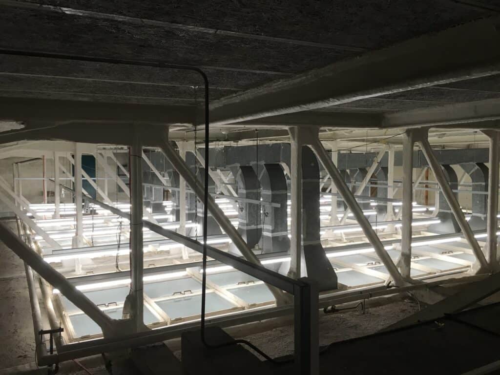 LED lighting installation replacing outdated fixtures for energy efficiency.