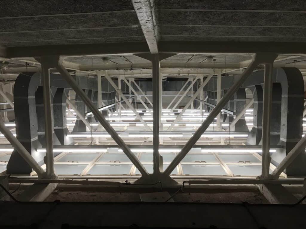 LED lighting upgrade replacing outdated fixtures for energy efficiency.